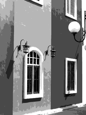 In this example, the bitmap contains painted building facades in strong magenta, orange, and blue colors. We use custom RGB channel weights to control how these colors turn into gray: increasing a channel multiplier makes image areas rich in that channel move toward lighter gray tones, while lower multipliers keep them darker. We also limit the output to eight gray colors, which breaks the wall paint and plaster texture into spotted, poster-like patches. (Source: Pexels.)