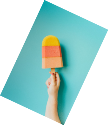 In this example, we correct the orientation of a BMP photo of a colorful ice cream held in a hand. We enter -25 degrees, and the negative angle rotates the image clockwise until the ice cream points straight up. The turn creates four empty corners around the tilted photo, which we fill with the default white background. (Source: Pexels.)