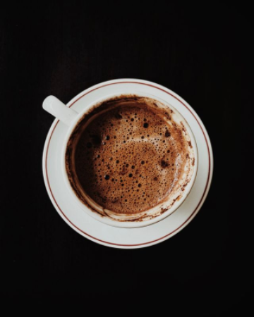In this example, we rotate a BMP photo of an espresso cup directly in the input preview. We drag the image counterclockwise by eye until the cup handle points to the left. The tool measures this visual adjustment in radians and displays the resulting value of 0.65 radians in the options, which is approximately 37.2 degrees. As the original bitmap has a solid black background, we also fill the newly created corners with black. The matching colors blend together, making the boundary of the rotated image impossible to notice. (Source: Pexels.)