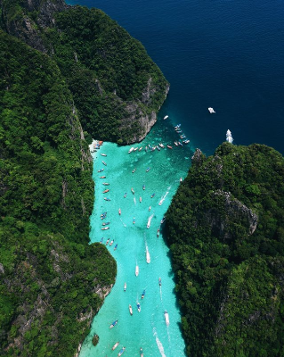 In this example, we convert an aerial BMP photo of a lagoon into uppercase hex bytes in BGR order – blue, green, and red. Each byte has a 0x prefix, which is commonly used in programming to identify hexadecimal values. We separate the three bytes of each pixel with dashes, separate neighboring pixels with spaces, and place each bitmap row in round brackets on a separate line. (Source: Pexels.)