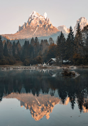 In this example, we vertically flip a BMP image of a mountain reflected in a calm lake. The mountain and its reflection in the lake switch places: the reflection moves to the top of the bitmap, while the real mountain moves to the bottom. (Source: Pexels.)