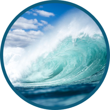 In this example, we remove the dark teal border around a round BMP photograph of an ocean wave. The border is 13 pixels wide on every side, so we enter 13 for all four widths and select the round shape. We also set the background to white, which fills the four corners outside the circular photo. (Source: Pexels.)